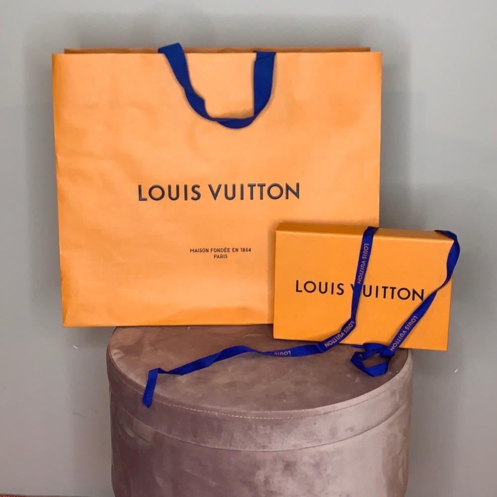Louis Vuitton shopping bag, box, and ribbon